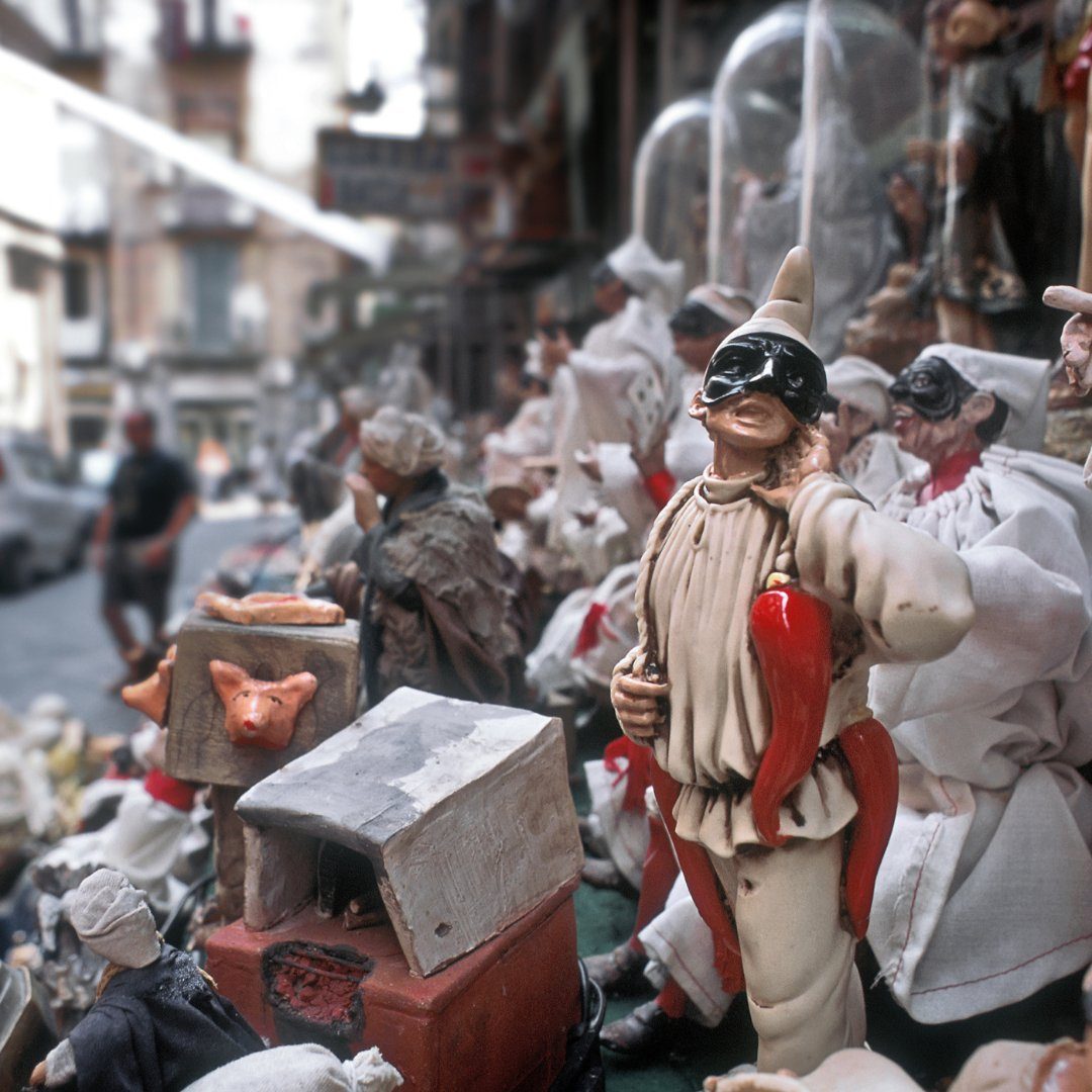 Handmade Pulcinella figurines at a workshop on San Gregorio Armeno in Naples